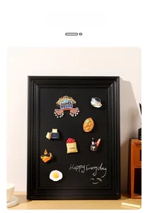 Macro detail of decorative 3D magnetic fridge magnets in a stylish display frame