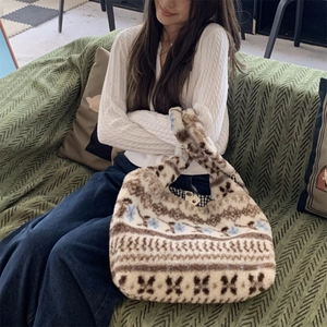 Ethnic plush tote bag featuring vintage floral patterns and spacious shoulder strap design