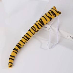 Detailed view of plush tiger tail with black stripes and elastic strap for cosplay