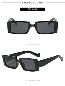 Detail view of vintage square sunglasses in black with thick frames and dark grey lenses