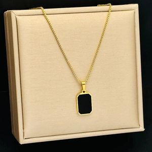 Golden titanium steel necklace with rectangular black shell pendant for a modern look
