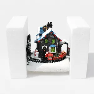 Décoration maison de Noël lumineuse protégée par un emballage en mousse sûr
