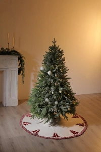 Detail of 48-inch knitted Christmas tree skirt with red 3D patterns and tassels