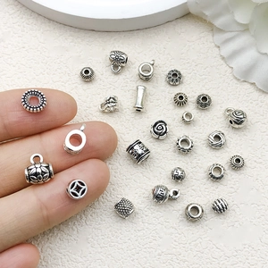Assorted silver Tibetan style metal beads and charms for DIY jewelry making and bracelets