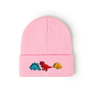 Pink knit beanie for girls featuring cute colorful cartoon dinosaur embroidery details
