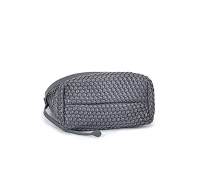 Detail view showing the reinforced woven texture and base stitching of the gray PU tote bag