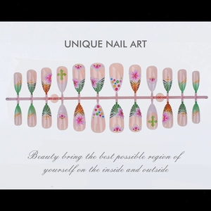 Detail of 3D pink cherry blossom almond press-on nails with leopard and cross designs