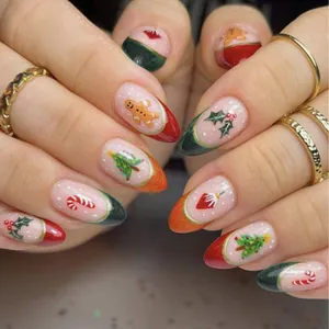 Detailed view of Christmas press-on nails with festive patterns and glossy finish