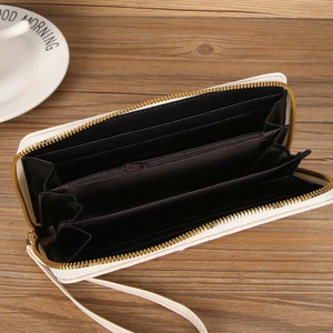 Internal layout of long cherry embroidered wallet with card slots and zipper pocket