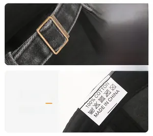 Detail of adjustable metal buckle and 100% cotton washing label on vintage baseball cap