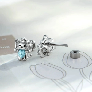 Cat chef silver stud earrings featuring light blue heart gemstone with screw back design