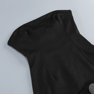 Detail of black tube top dress featuring slim fit cut and premium knitted fabric texture