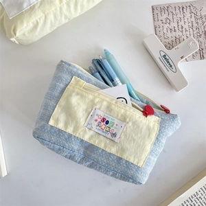 Detail of cute floral canvas pencil case with large capacity and multi-layer storage