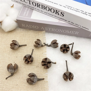 Flat lay of natural pine cones on rustic linen for Christmas tree decoration