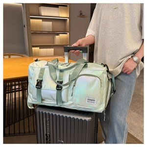 Green holographic waterproof fitness bag shown on luggage for travel scene