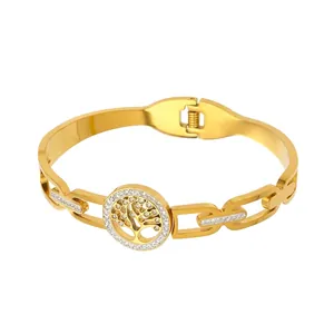 Detailed close-up showing gold stainless steel tree of life bangle and its dimensions