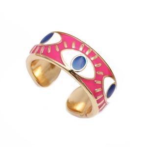 Close-up of pink enamel wave ring with blue evil eye detail and golden finish