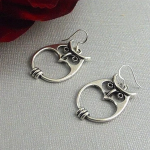 Vintage silver owl drop earrings with hollowed-out bird design and hook attachment