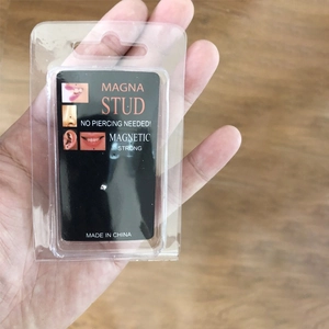 Silver non-piercing magnetic stud for nose and lips shown in retail packaging