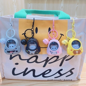Cute space capsule cat keychain light in four colors on white canvas bag with bell charms