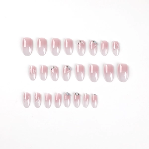 Pink and white gradient short press-on nails set with rhinestones and flower petal patterns