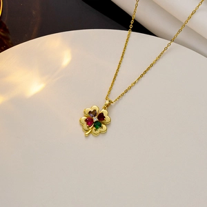 Lucky four-leaf clover pendant necklace with colorful heart stones on gold chain