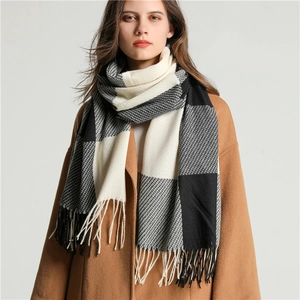 Plaid tassel scarf for men and women in soft black, white, and grey cashmere-like fabric