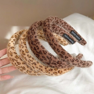 Fuzzy leopard print headband set in vintage plush fabric with handmade label details