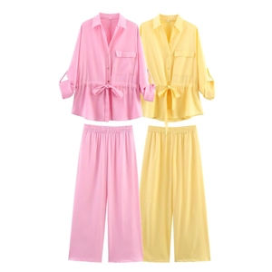 Women's safari style loose shirt and trousers two-piece set in pink and yellow colors