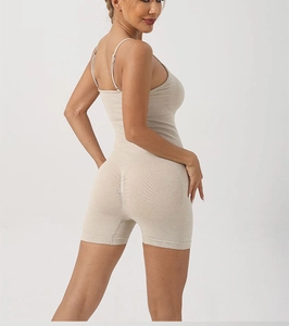 Detailed back view of scrunch butt beige yoga bodysuit featuring high-stretch seamless fabric