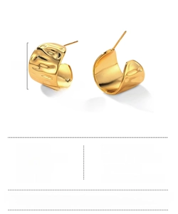 Macro detail of chunky gold water drop earrings showing 18mm size and textured finish
