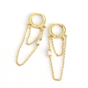 Elegant gold hoop earrings with double chain tassel and rectangular zircon on white background