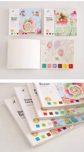 Portable watercolor coloring book detail showing paint blocks and ocean drawing sheets