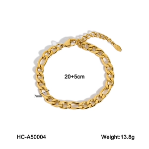 Detailed view of 18K gold stainless steel 7mm curb chain with size tags and measurements