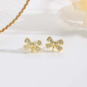 Elegant gold butterfly stud earrings set with sparkling cubic zirconia stones for women