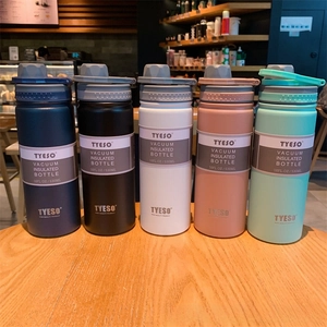 Detailed row of TYESO 530ml stainless steel vacuum flasks in five assorted colors