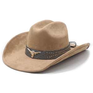 Detail of camel suede cowboy hat featuring a black rivet band and gold bull head emblem