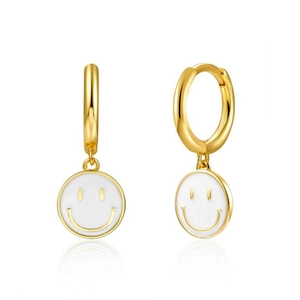 Cute 18K gold smile earrings with white enamel charms on a clean white surface