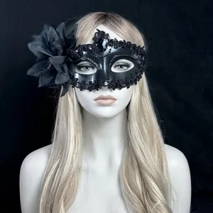 Elegant black lace masquerade mask with flower and rhinestones for party wear