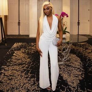 Elegant white halter neck wide-leg jumpsuit with deep V-neck and draped fabric detail