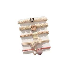 Set of 5 high elasticity hair ties in beige and pink with pearls and cute charms