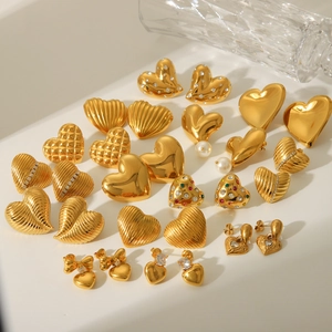 Various 18K gold plated heart earrings with textured finishes, pearls and crystals