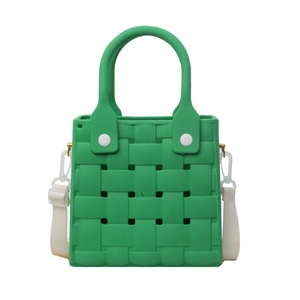 Green EVA square perforated bag with woven texture and white webbing crossbody strap