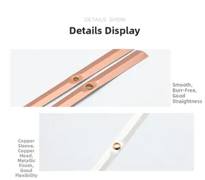 Detailed view of quartz clock hands with copper sleeves and smooth metallic finish
