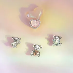 Colgante de corazón en plata 925 y cuentas de oso con piedras rosas brillantes