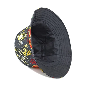 Reversible black bucket hat with colorful beach graffiti prints and take me to the beach text
