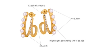 Detail view of gold double-layer earrings with Czech diamonds and synthetic shell beads