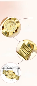 Detail of gold quartz watch with diamond dial, steel band, and waterproof feature