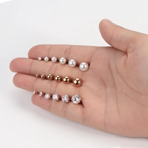 Rose gold stainless steel stud earring set with pearls and cubic zirconia in various sizes