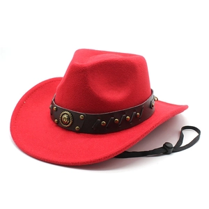 Detail of red wool cowboy hat featuring black leather band with brass rivets and wind cord